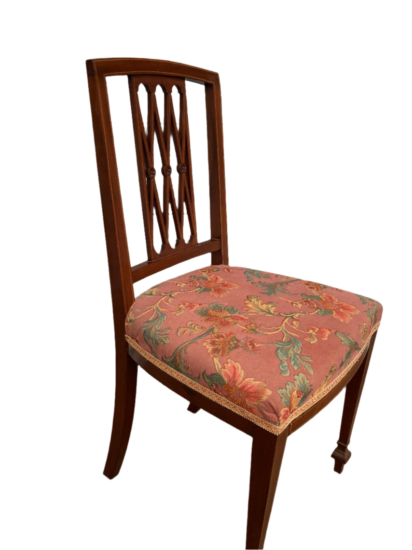 Single antique dining chair with floral seat and gold inlaid trim on back rest