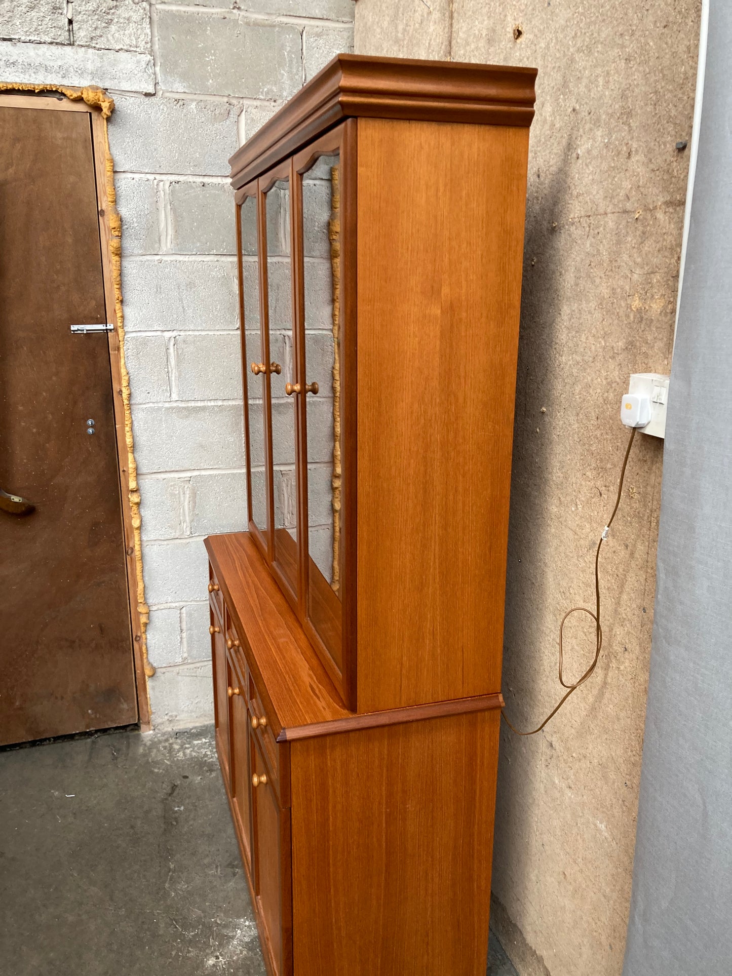 A Sutcliffe teak display cabinet