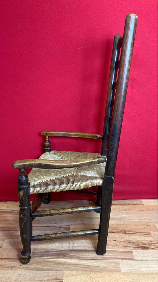 Antique Georgian Period Elm Ladderback Fireside Armchair with Rush Seat, c.1800.