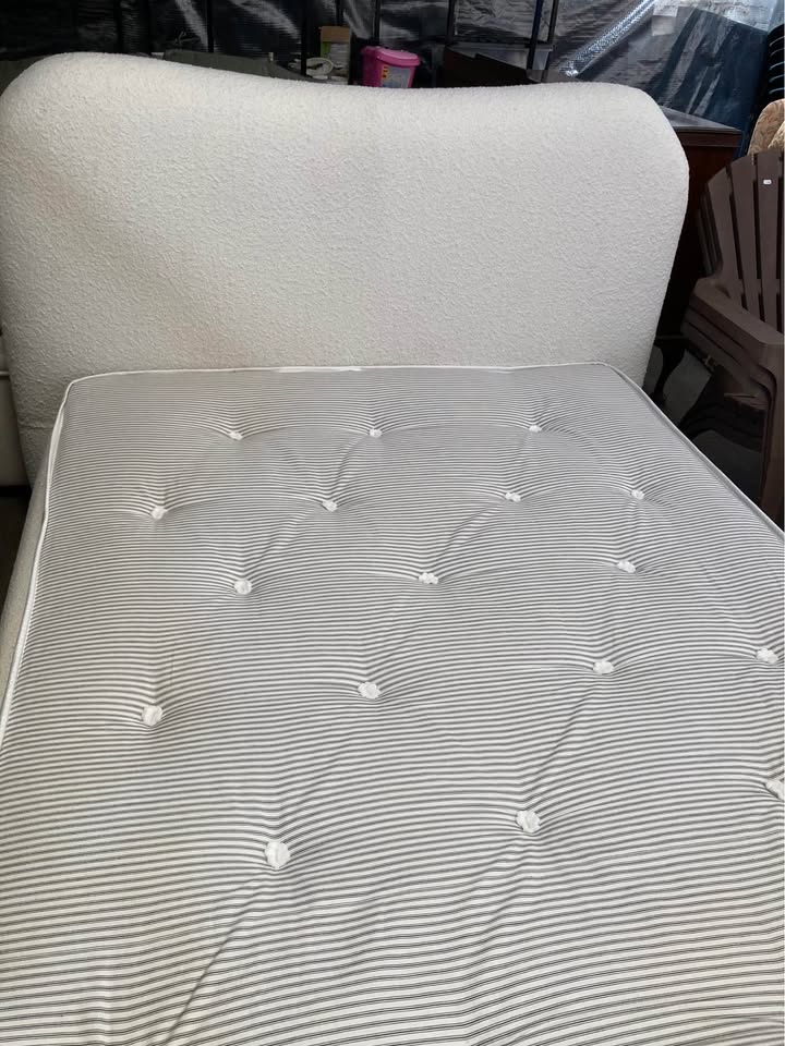 A brand new double Dunelm bed with a ex display mattress from British bed company